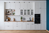 Modern home kitchen interior design in white tones