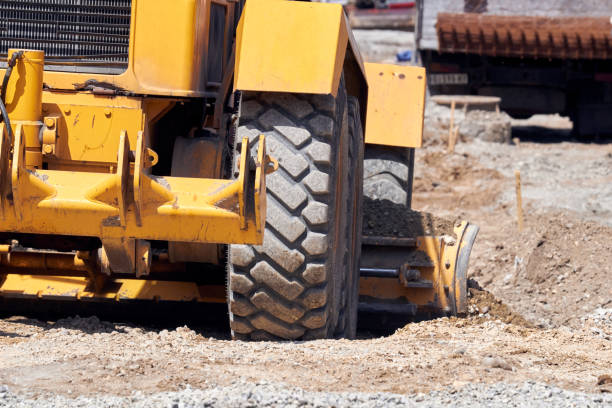 istock Heavy construction machines outdoors for public place reconstruction. 1360325846