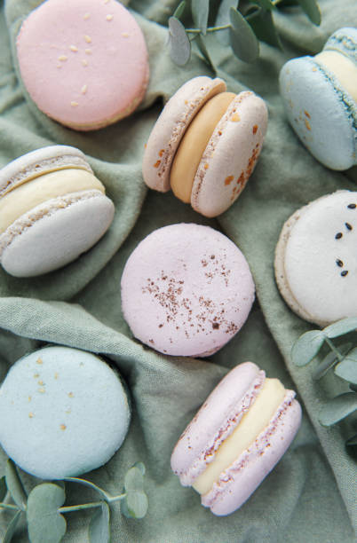 istock Beautiful colorful tasty macaroons on a textile background 1360330854