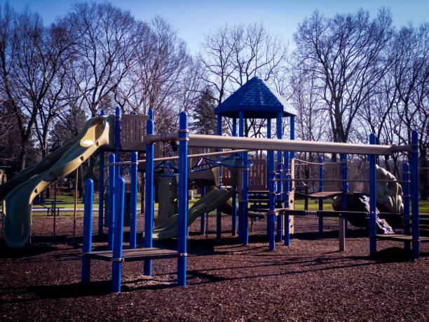istock Sunny Day on the Playground 1360337346