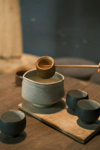 istock Chinese rice wine and bamboo spoon 1360339093