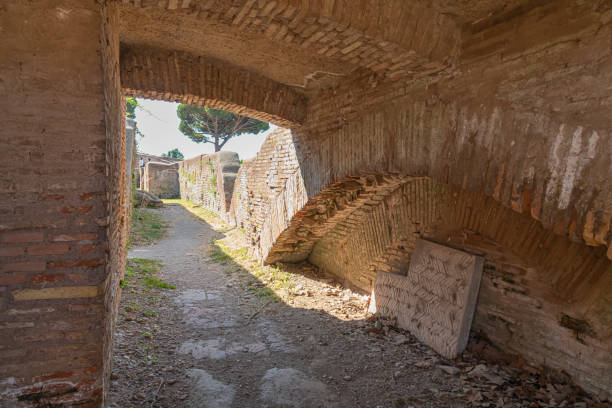 Ostia antica, Italy 21.07.2021:  Caserma dei Vigili, The imposing barracks testifies to the importance that the body of firefighters in the city, who performed functions of both urban police and firefighters, for the protection of warehouses and their contents.