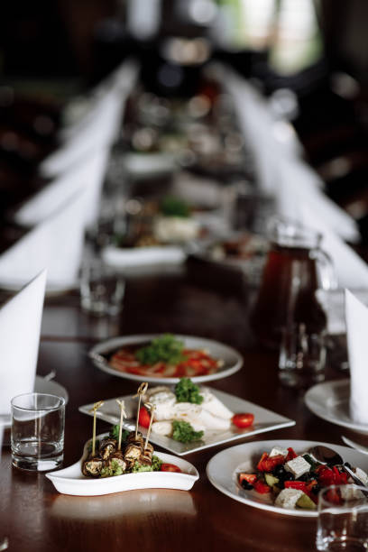 istock Beautiful table set for an event party or wedding reception . restaurant interior 1360343970