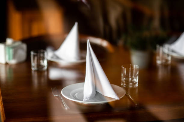 Beautiful table set for an event party or wedding reception . restaurant interior.