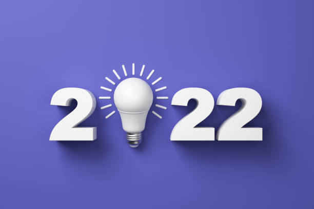 istock 2022 with a white LED lamp on a purple background. 1360347603
