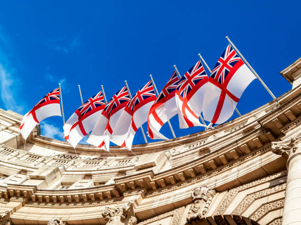 istock White Ensign flags of the Royal Navy 1360350531