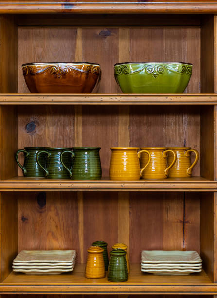 istock Cabinet with colorful bowls, plates, and cups 1360351157