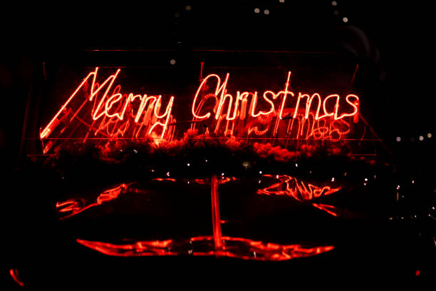 istock led red Christmas decoration and ornaments over abstract bokeh background with copy space. Holiday background greeting card for Christmas and New Year. Merry Christmas 1360355034
