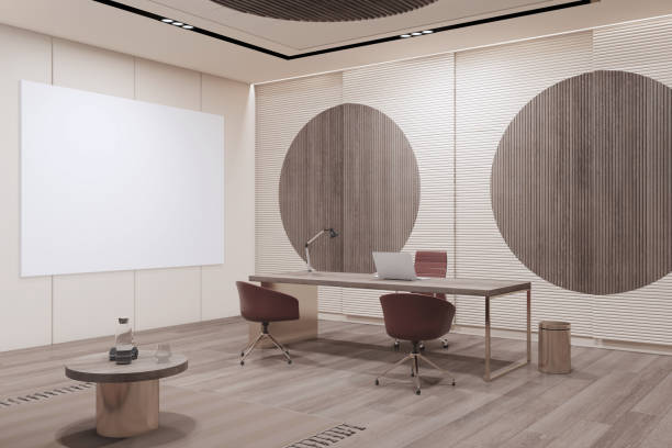 istock Modern wooden office interior with empty white mock up frame, furniture and decorative wall. Workplace and design concept. 3D Rendering. 1360358784