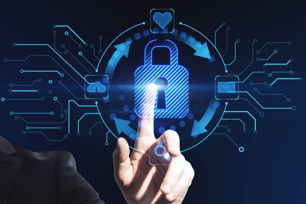 istock Man hand pointing at abstract glowing blue padlock hologram on blurry background. Internet, information, technology and security concept. Double exposure. 1360358993