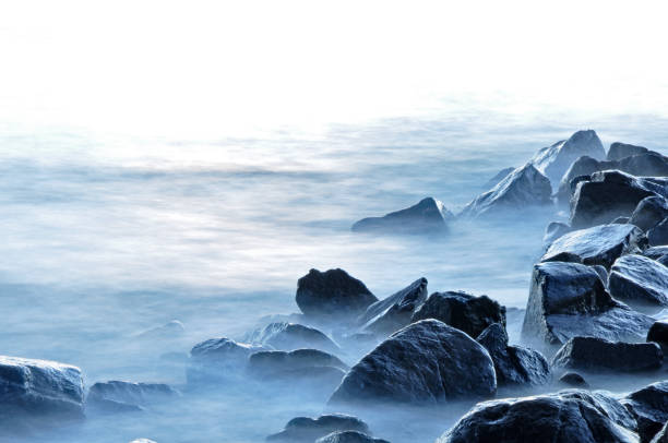 istock Wave Flowing over Rocks on Lake Superior at Tettegouche State Park, Minnesota 1360367664
