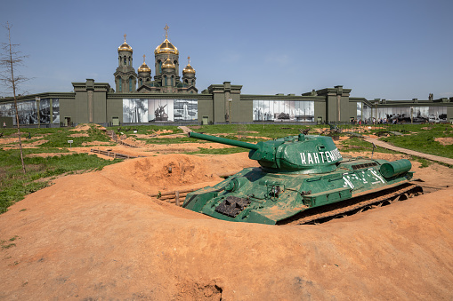 Park Patriot, Moscow region, Russia - May 17, 2021: Zone of military-historical reconstructions of the events of the Second World War in Patriot Park. Soviet tank T-34 in defensive fortifications