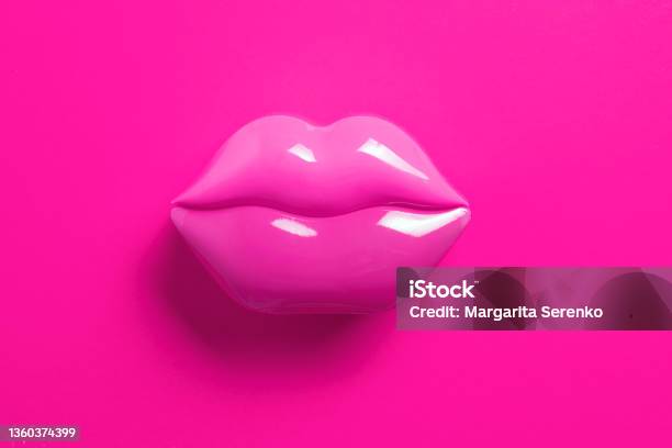Artificial Pink Lips Shape On Pink Background Flat Lay Beauty Care Perfection Concept Minimalism Stock Photo - Download Image Now