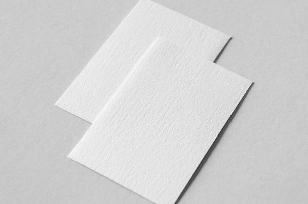 istock Textured business card mockup, vertical orientation. 55x85 mm. 1360377970