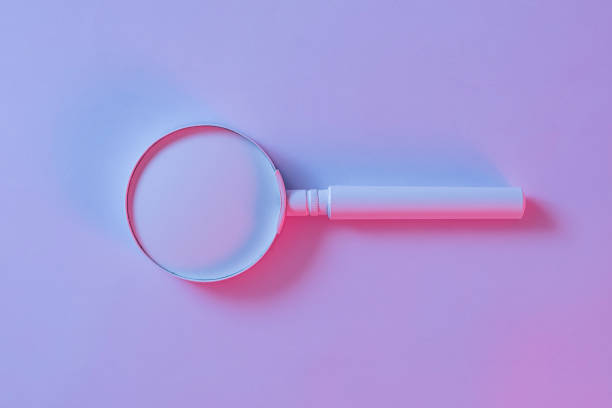 istock Studio close-up from above of an old magnifying glass 1360380378