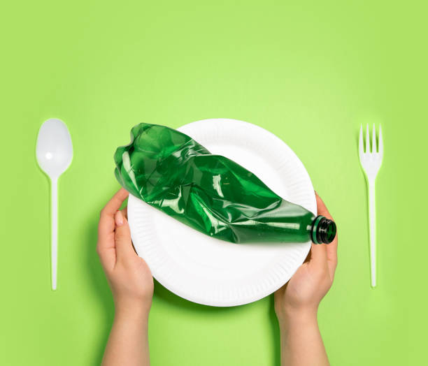 istock Stop plastic - concept of environmental pollution. Contemporary art collage, modern design. Human hand with plastic goods 1360382938