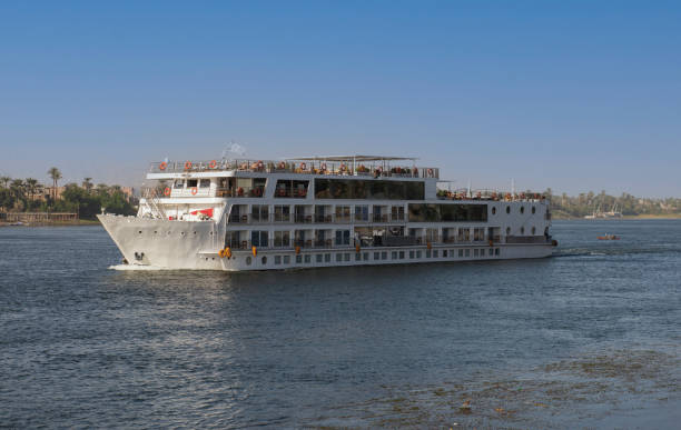 istock Large egyptian river cruise boat sailing on Nile 1360384400