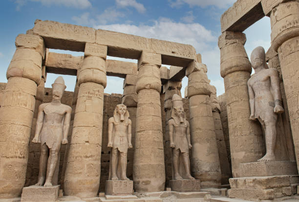 istock Large statues of Ramses 2nd at Luxor Temple in Egypt 1360384659