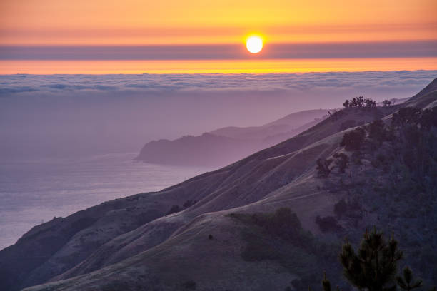 istock Sunset over the Pacific Ocean in Big Sur, California 1360386679