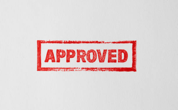 Approved Approved red grunge stamp on white paper. representing stock pictures, royalty-free photos & images