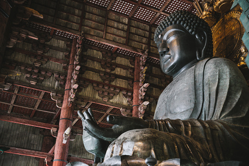 Nara, Japan - September 13th, 2018: The Daibutsuden at Nara has the world's largest bronze statue of the Buddha.