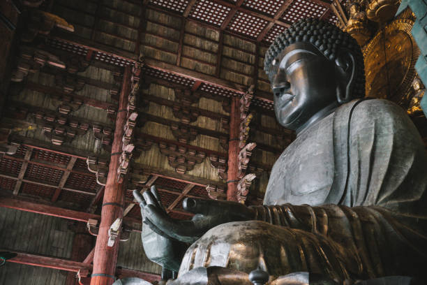 Great Buddha in Nara Nara, Japan - September 13th, 2018: The Daibutsuden at Nara has the world's largest bronze statue of the Buddha. nsra stock pictures, royalty-free photos & images