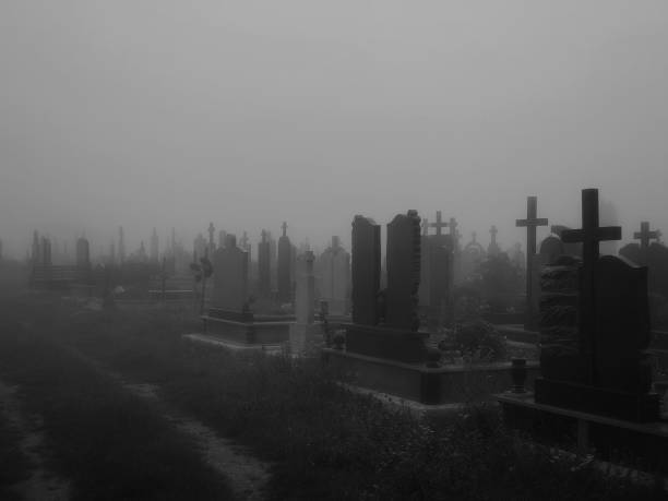 istock Crosses and graves in the old abandoned cemetery. 1360390367