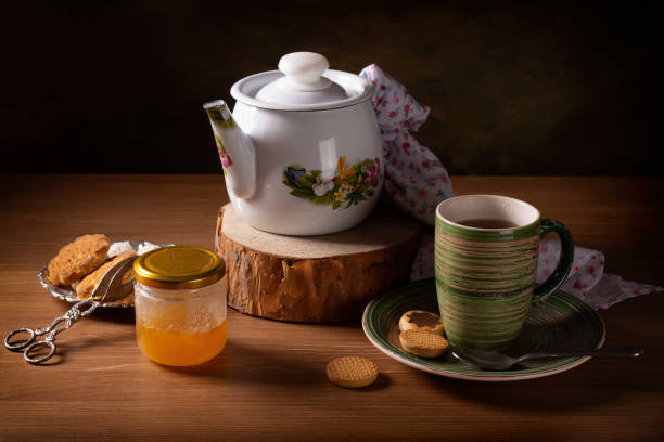 istock Still life with hot tea and honey on the table 1360392748