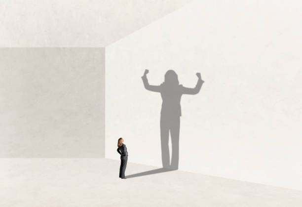 istock Shadow Of Woman Aspiring To Confidence 1360398340