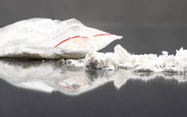 synthetic white crystal drugs, white powder cocaine amphetamine stock photo