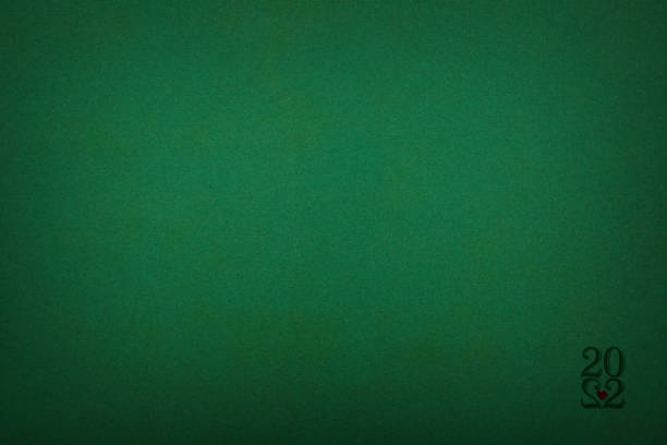 istock Abstract green paper texture background, naturally lit in studio as desing element for christmas, St. Patrick's day or holiday concept for year 2022 1360400499