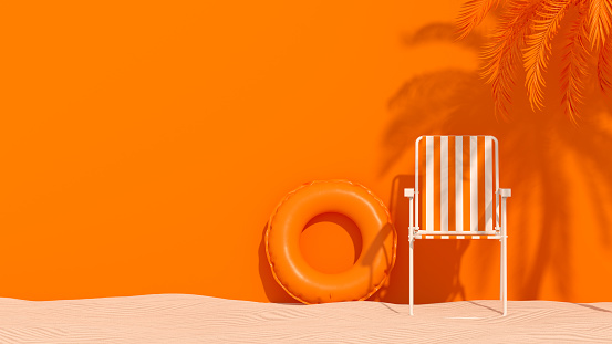 Vacaciones de verano viaje de playa de fondo palmera con silla y anillo inflable sobre arena photo