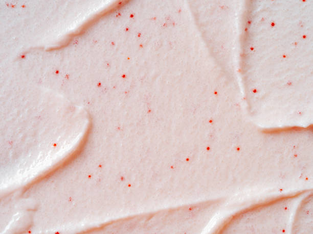 istock Scrub smears. Pink exfoliating body polish texture 1360401977