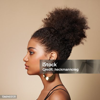 istock Beauty portrait of African American girl with afro hair 1360403131