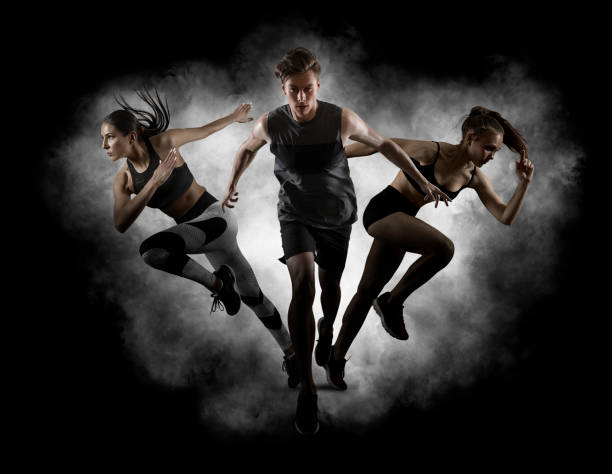 istock Running collage. Man and women running on smoke background 1360404260