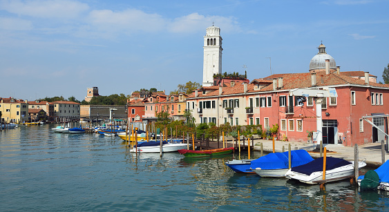 The Island of San Pietro with its curious leaning  Tower, Venice.