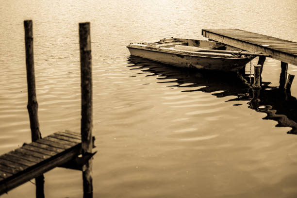 old row boat at a lake - photo