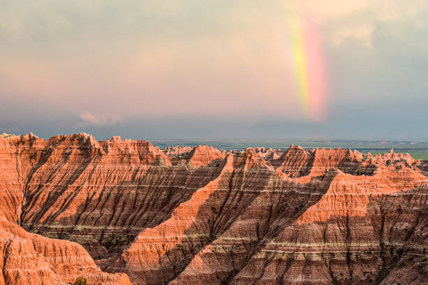 Badlands Rainbow Rainbow at sunset. Badlands National Park badlands stock pictures, royalty-free photos & images