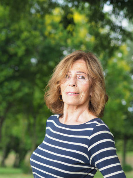 istock portrait of a fit active lady in the park in spring 1360414921