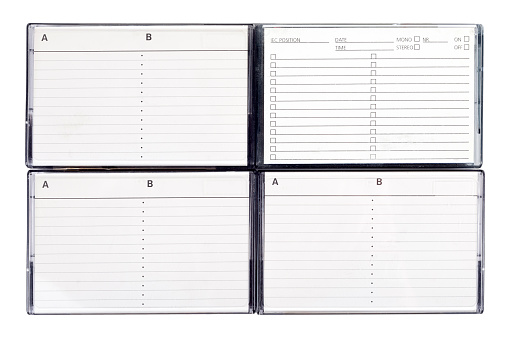 4 cassette tape boxes, cases, blank empty A and B side titles description tables, placeholders template, object isolated on white, cut out, nobody. Music album tracklist, track list tables closeup