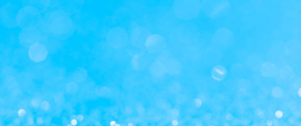 istock sparkles of Blue glitter abstract background. Copy space 1360420709