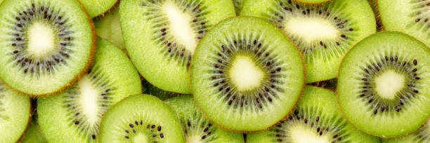 istock Kiwi fruit kiwis fruits background panorama from above 1360427575