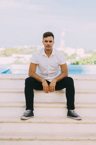 istock hipster male model making serious face 1360430981