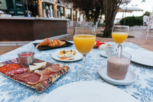 istock Front view of a continental breakfast on a terrace 1360431351