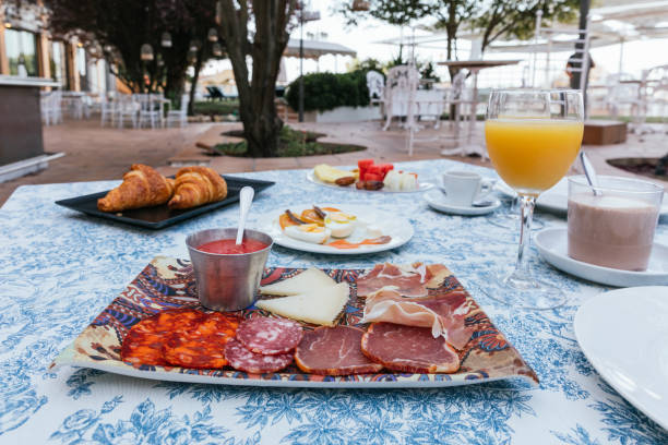 istock Front view of a continental breakfast on a terrace 1360431356