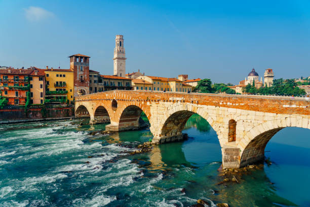 Ponte Pietra with Adige river in Verona, Italy stock photo
