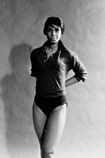 Black and white Image taken in the 60s: Studio headshot of a young man