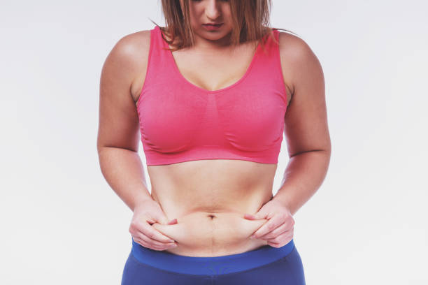 istock Fat woman dieting 1360434498