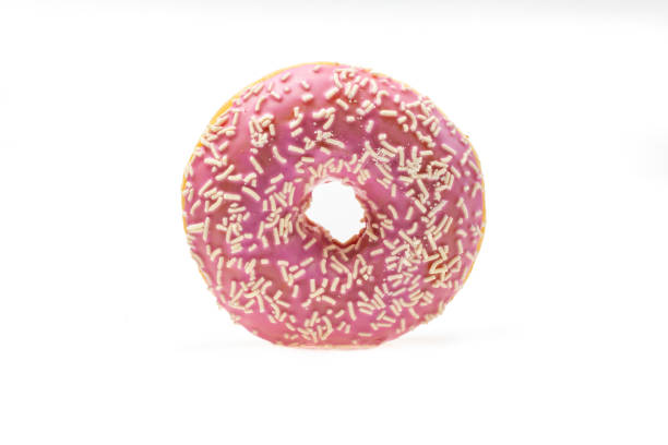 two delicious, colorful donuts on white background