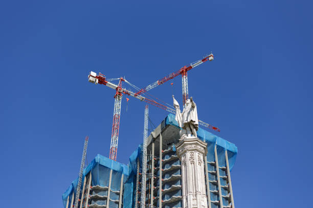Madrid, Spain. September 12, 2021. Buildings under construction next to the statue of Christopher Columbus in Plaza de Colon, Madrid